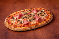 Pinsa Prosciutto & Funghi ca. 30x15cm